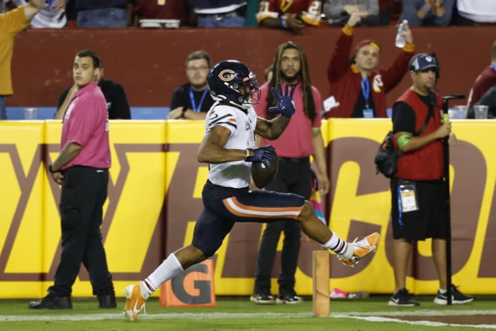Oct 5, 2023; Landover, Maryland, USA; Chicago Bears wide receiver DJ Moore (2) scores a touchdown against the Washington Commanders during the fourth quarter at FedExField.